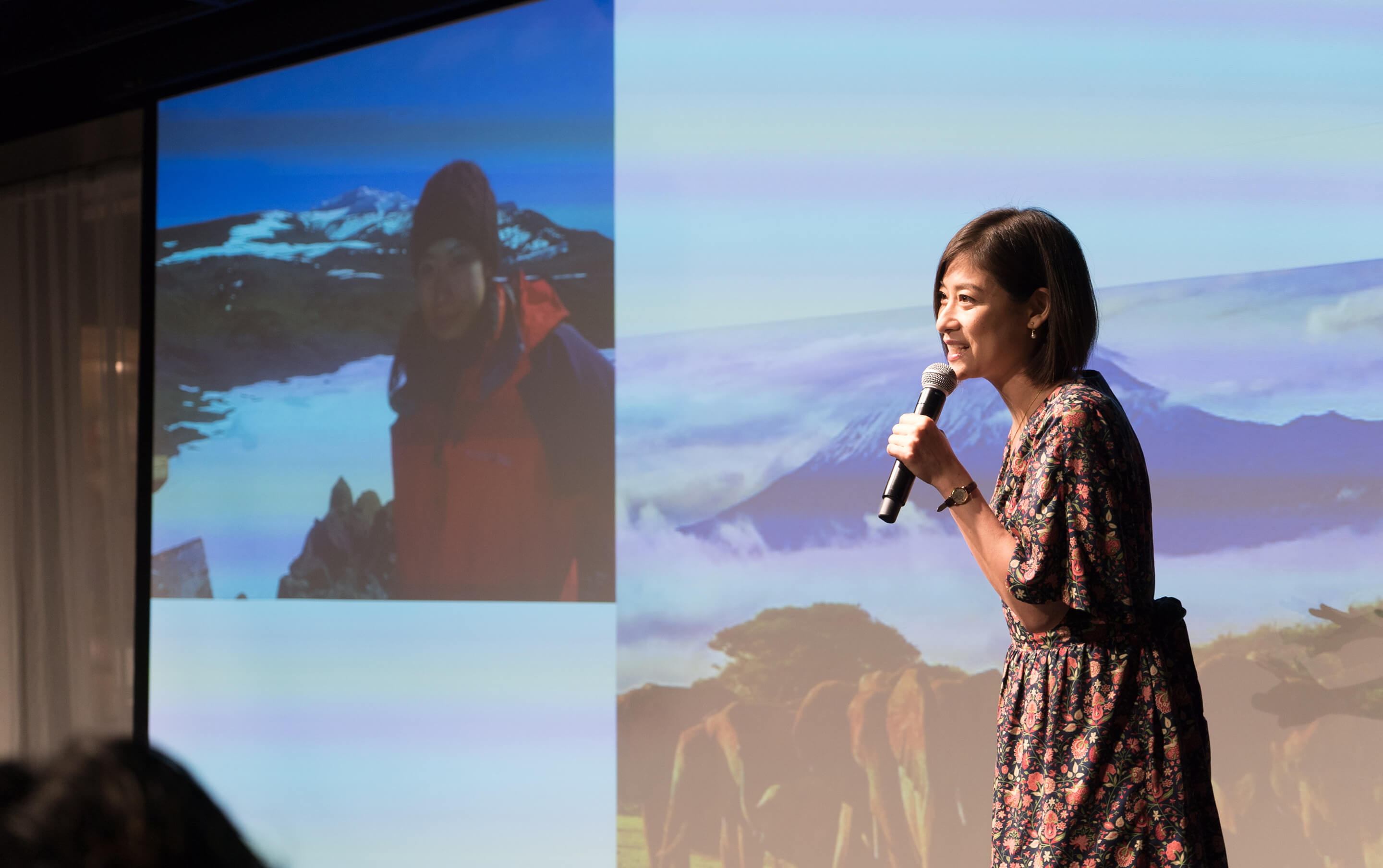 講演をしている代表の写真